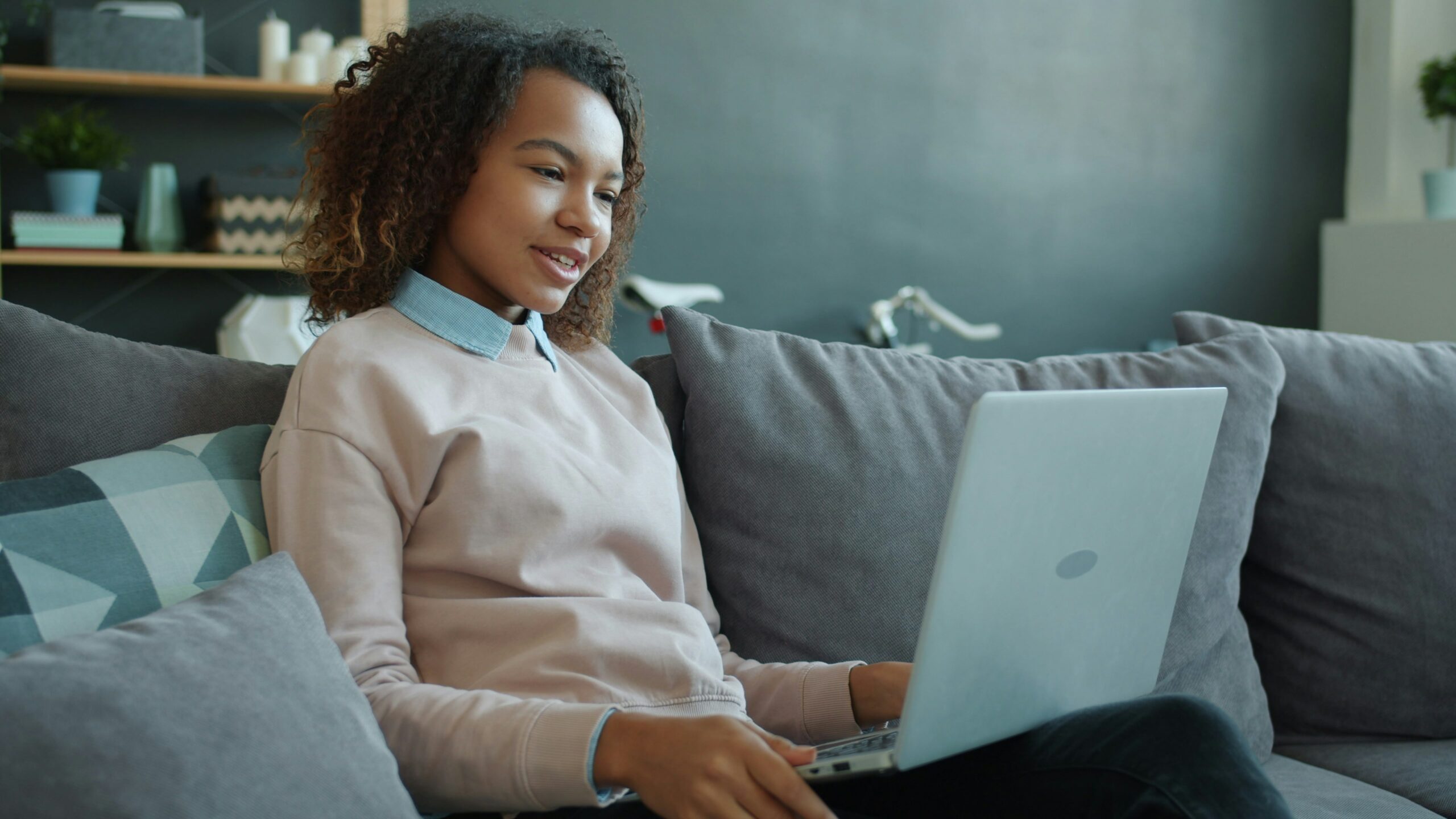 Student joining a virtual leadership session on a laptop